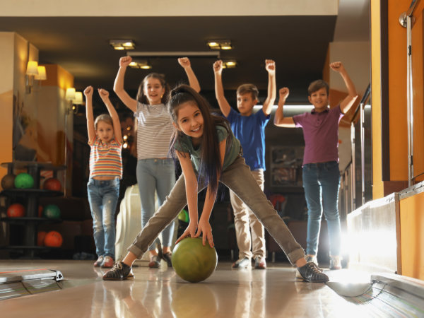 kids playing bowling