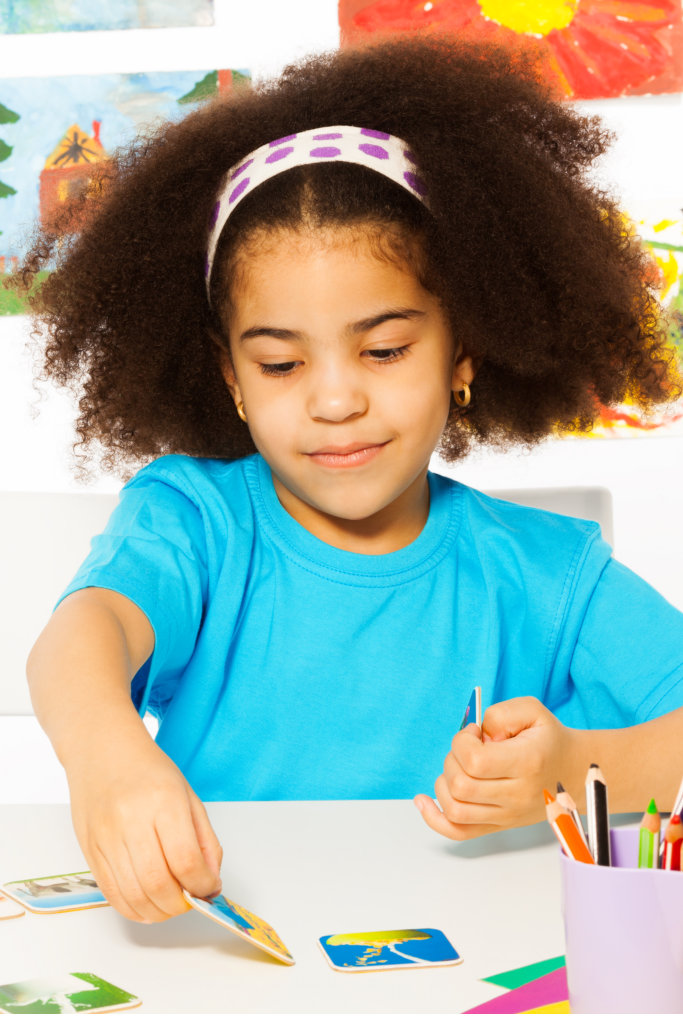 young girl doing artworks